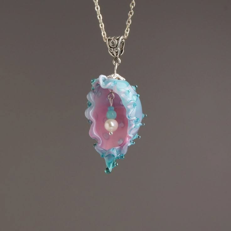girlwhoblooms's tweet photo. mermaid cone glass conch pendant https://t.co/Seb8QXWaSJ