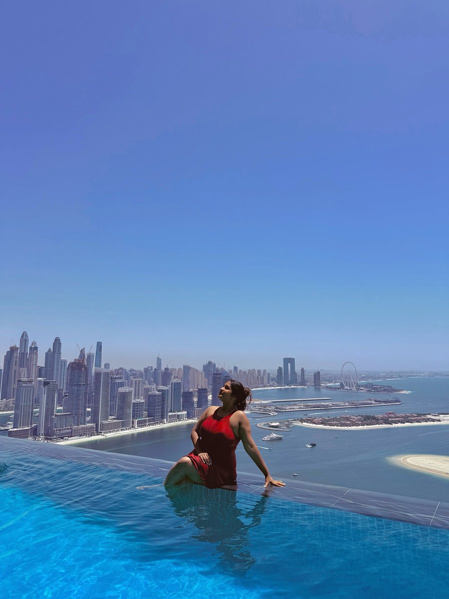 borisypriscila's tweet photo. Head in the clouds, making the most of Dubai’s cloudy days. Beach hair, pool time, and a little tourist energy. https://t.co/VYlc3KF036