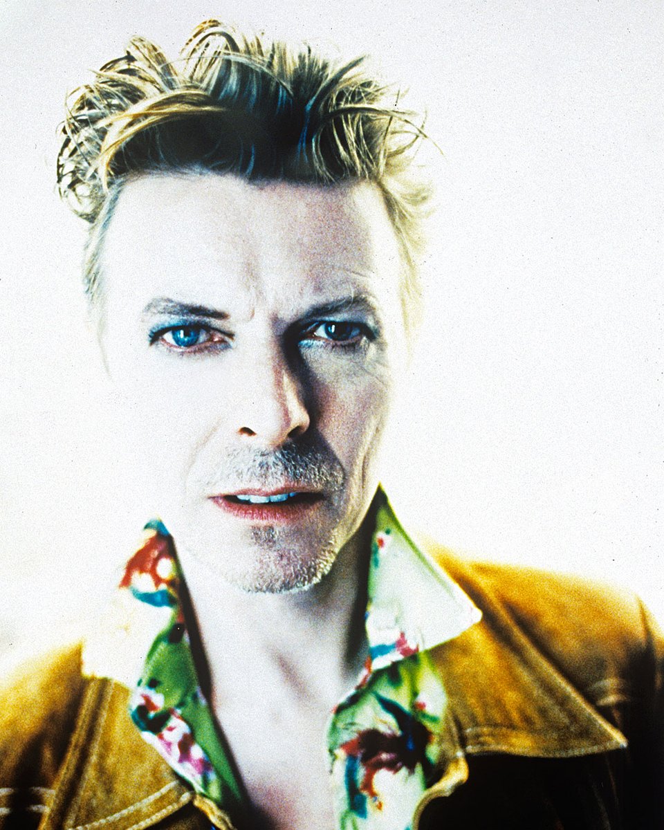 DavidBowieReal's tweet photo. DAVID BOWIE - BOWIE80 - PRESS RELEASE

“Feels like something’s gonna happen…”

DAVID BOWIE - BOWIE80 is a celebration of one of the world’s most influential artists, whose impact can be seen, heard and felt across all forms of art and in mainstream and outsider culture spanning both the 20th and 21st Centuries.

Starting today and continuing throughout 2027, the year of Bowie’s 80th birthday, there will be special events, releases, anniversaries, collaborations and fan experiences all over the globe, exclusively announced via a specific site, https://t.co/Ire6SZO32y, all branded with the new Bowie80 logo.

Here are edited details of some of the forthcoming highlights. Read the full press release here (https://t.co/MGr4lPRgP7) for more.

(Some of the links are being updated, so try again later if they’re not working for you now.)

~ Exclusive partnership with US-based premium department store Nordstrom, celebrating Bowie's enduring influence on fashion through three immersive shops in their Seattle, NYC, and Chicago flagships, and https://t.co/o3dyhZ3piK.

~ The Rock & Roll Hall of Fame in Cleveland is planning a Bowie80 celebration anchored by a dedicated retail pop-up running mid-November through January across its Museum store, online shop, and airport location.

~ Morrison Hotel Gallery will mark David Bowie’s 80th year with Strange Fascination, a major photography exhibition celebrating the artistry, evolution and fearless reinvention of one of the most photographed and visually transformative figures in modern culture. The exhibition will open early February 2027 in New York City and West Hollywood.

~ BOWIE (breaking) GLASS is a new live symphonic concert production, developed by Schirmer Theatrical together with Østre Gasværk Teater, bringing David Bowie’s iconic songs and voice into a bold new musical and visual dialogue with Philip Glass. Featuring Bowie’s original recordings alongside live vocalists, musicians and orchestra, this official concert experience will have its world premiere in Copenhagen in Spring 2027. Online at https://t.co/uUnhl1L1Tt.

~ Perryscope Productions, longtime merchandising representatives for David Bowie, will be launching exclusive Bowie80 merchandise in the official David Bowie webstore found at https://t.co/3GpudJx4nl, and the official David Bowie Amazon store effective immediately.

~ The acclaimed show David Bowie: You’re Not Alone, will reach new audiences in 2027, with runs in Manchester and Brighton, as well as its first European venue, Port des Lumières in Hamburg.

~ The V&A’s David Bowie : On Tour will see artefacts from Bowie’s 90,000-item archive touring the UK starting in Dundee before moving on to Blackpool in 2027, and visiting further venues in 2028 & 2029.

Throughout the remainder of 2026 and throughout 2027, there will be more announcements, including groundbreaking audiovisual presentations, experiences, and fan-centric activities worldwide.

📸 Enrique Badulescu 1995

#Bowie80