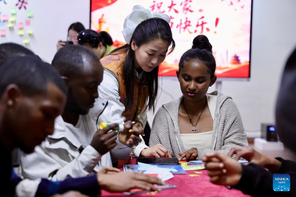chinafrica1's tweet photo. Chinese teacher Song Ruirong (C) talks with students at the Confucius Institute at the Addis Ababa University, #Ethiopia, Oct. 1, 2026. October 5 marks World Teachers' Day. Over the years, Confucius Institutes across Africa have actively promoted Chinese language education and cultural exchange, playing an important role in fostering mutual learning between China and African countries and strengthening friendship between the Chinese and African peoples. (Xinhua/Geng Xinning)
#worldteachersday