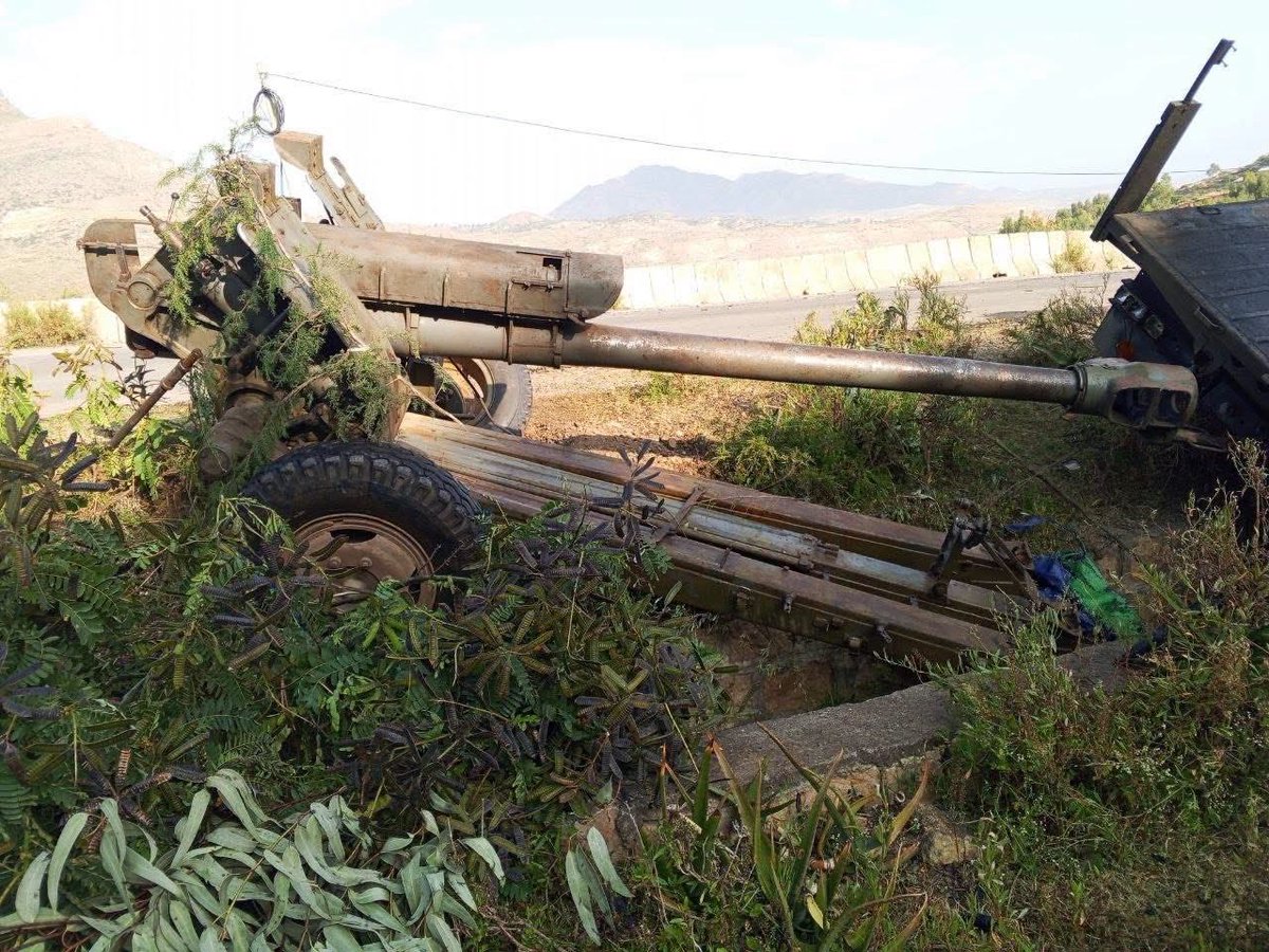BashirHashiysf's tweet photo. Situation Update 🚨 #Tigray 

Captured ENDF artillery, now Tigray facing the other way. Wukro front, Tigray using Foliage camo against Bayraktar and Wing Loong surveillance drones. 
old  Soviet M-46 130mm. 
Victory to the Alliance for Survival Wukro
ENDF forces pushing north of Wukro have been stopped  by heavy TDF resistance.
Their advance has stopped completely. If they keep pressing forward without securing the flanks, their rear supply lines will be left wide open to TDF counter strikes.

on the land ENDF Losses North of Mekelle Evidence shows heavy equipment losses on the Mekelle to Wukro axis. Abandoned transport trucks, a Land Cruiser and multiple howitzers sit disabled.
These positions indicate disrupted logistics and artillery support as ENDF elements try to push north

reliable source indicates Ethiopian forces push north along the A2 but were stopped by tdf 40 km north of Mekelle as Tigrayan forces hold positions around Wukro. Airstrikes are reportedly