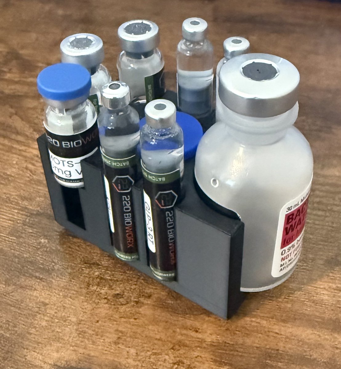 KevinPomaski's tweet photo. Ask and ye shall receive!
I present the “Rory” pep-prep stand.
30ml Bac water
10ml or 5ml vial
4x pen Carts + 3x 3ml Vials
Or 7 Pen carts. 
Not really sure why you fridge your Bacwater but, whatever. https://t.co/R02KSJd4Zk
