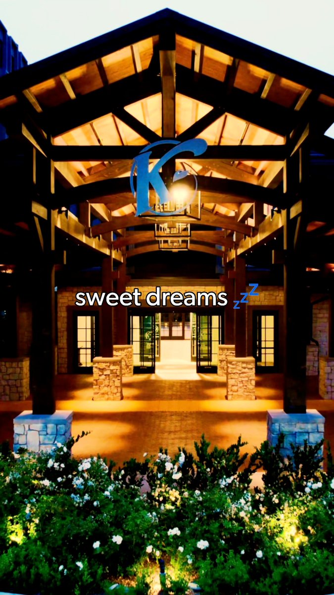 The exterior entrance of the 'KG Resort' is shown at twilight, featuring a large wooden porte-cochère with stone pillars, and a 'sweet dreams' text overlay with sleeping emojis is added.