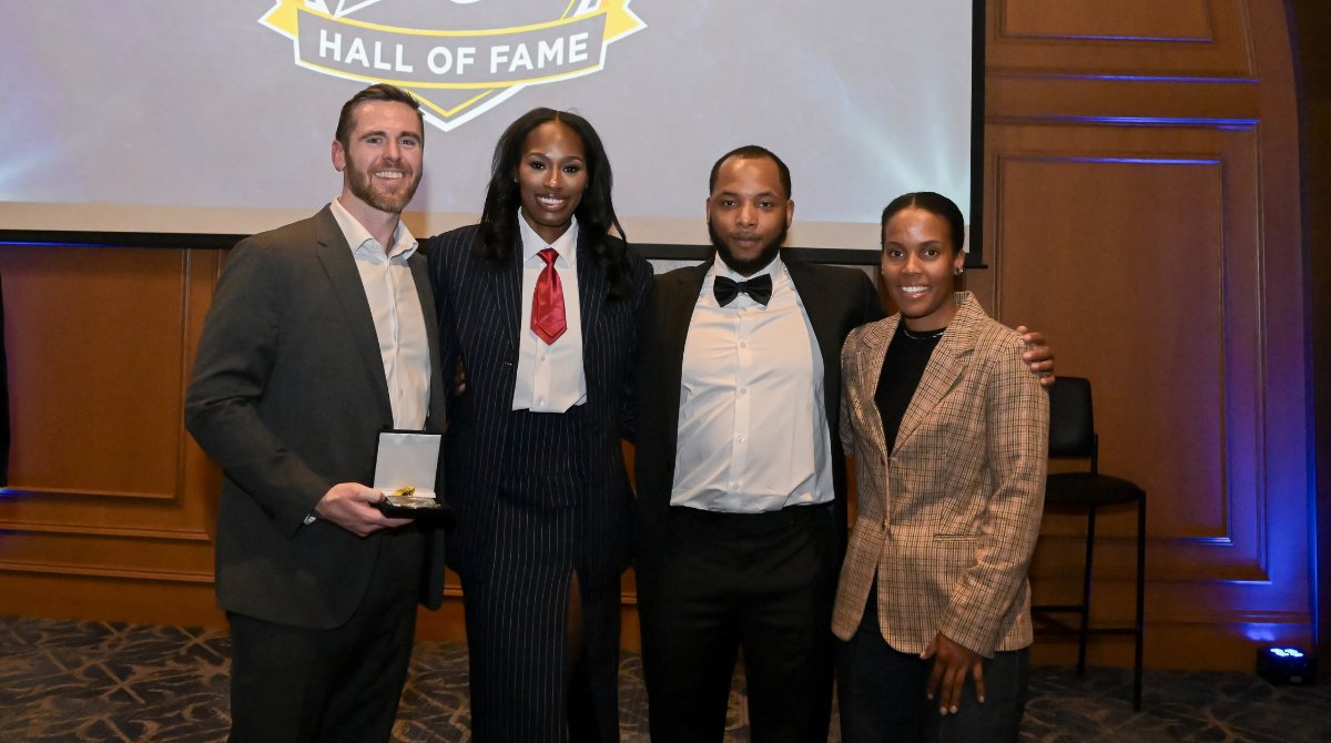 Merrimack's tweet photo. The Merrimack athletic department recently celebrated the newest members of the Hall of Fame. Congratulations to all of the inductees: Charlie Bertrand ’20, Denia Davis-Stewart ’20, Mikyla Grant-Mentis ’20, Juvaris Hayes ’20 and the 2018 Merrimack men's lacrosse team! https://t.co/isAd8DUABb