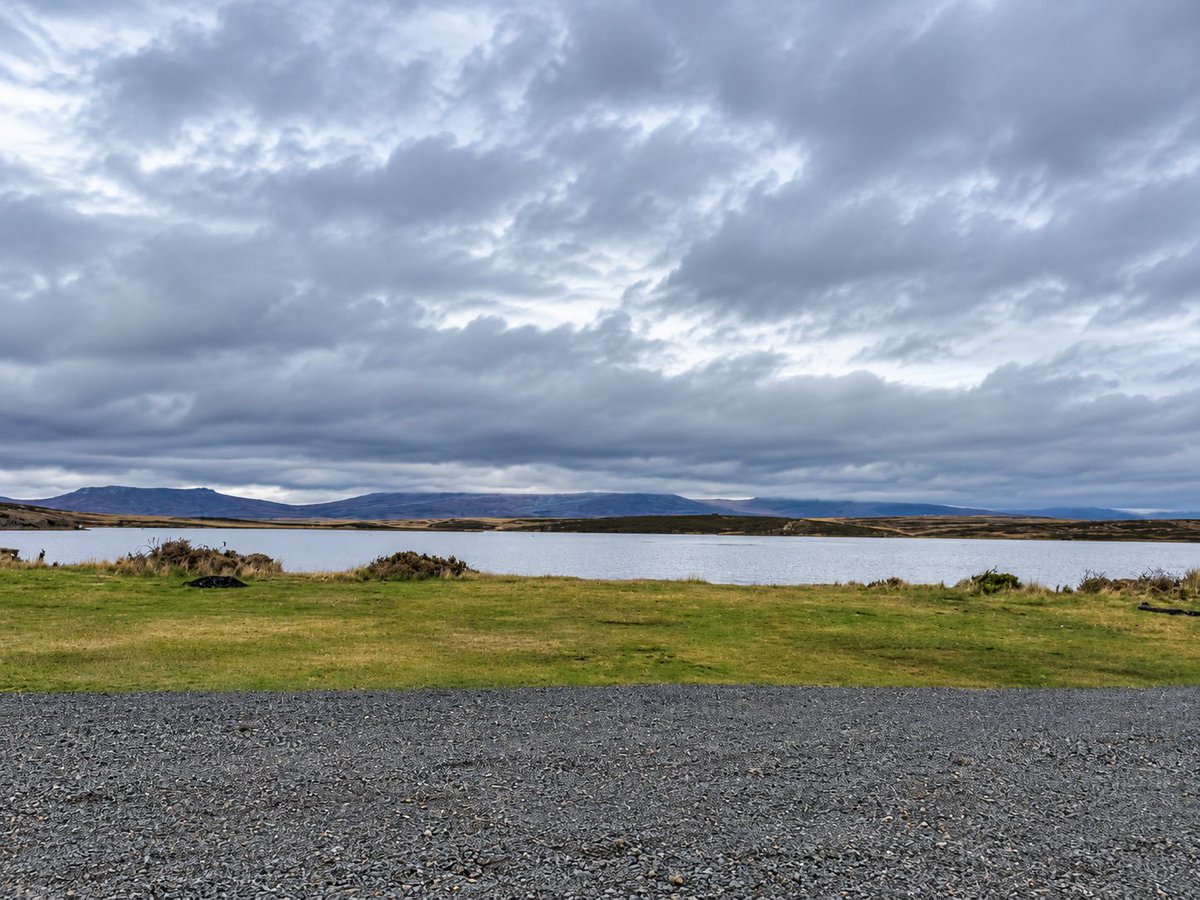 Colin_M_R's tweet photo. Good to visit Goose Green today and meet so many members of the community (including lots like us on a day trip from Stanley!). A beautiful setting, with powerful reminders.  #FalklandIslands https://t.co/XEg3bfRsJq