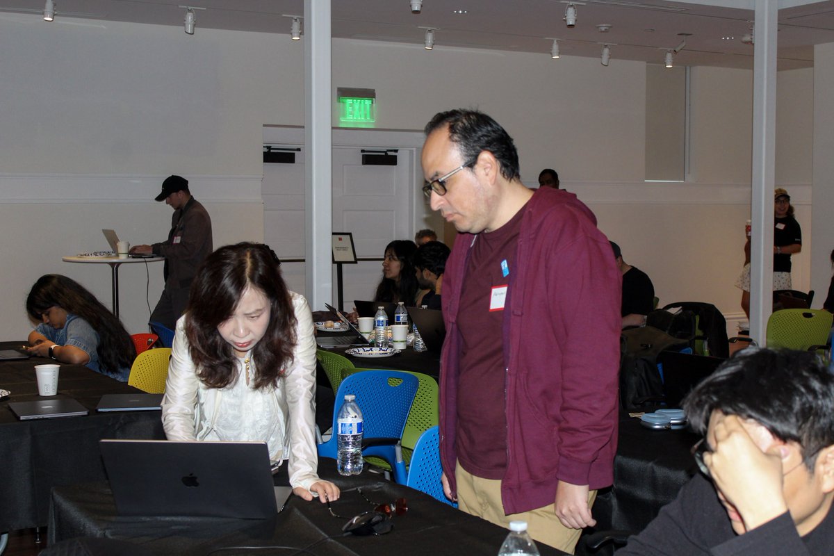 ZooWorkAI's tweet photo. At most tables, for most of the day, one person was typing and another was leaning over to see what the agent just did. https://t.co/2cuQ5EBz6K