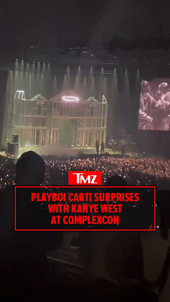 A TMZ graphic reading "PLAYBOI CARTI SURPRISES WITH KANYE WEST AT COMPLEXCON" is overlaid on a photo of a crowded concert stage featuring a house-like set structure with a halo above it, capturing the surprise appearance of Kanye West during Playboi Carti's ComplexCon set.
