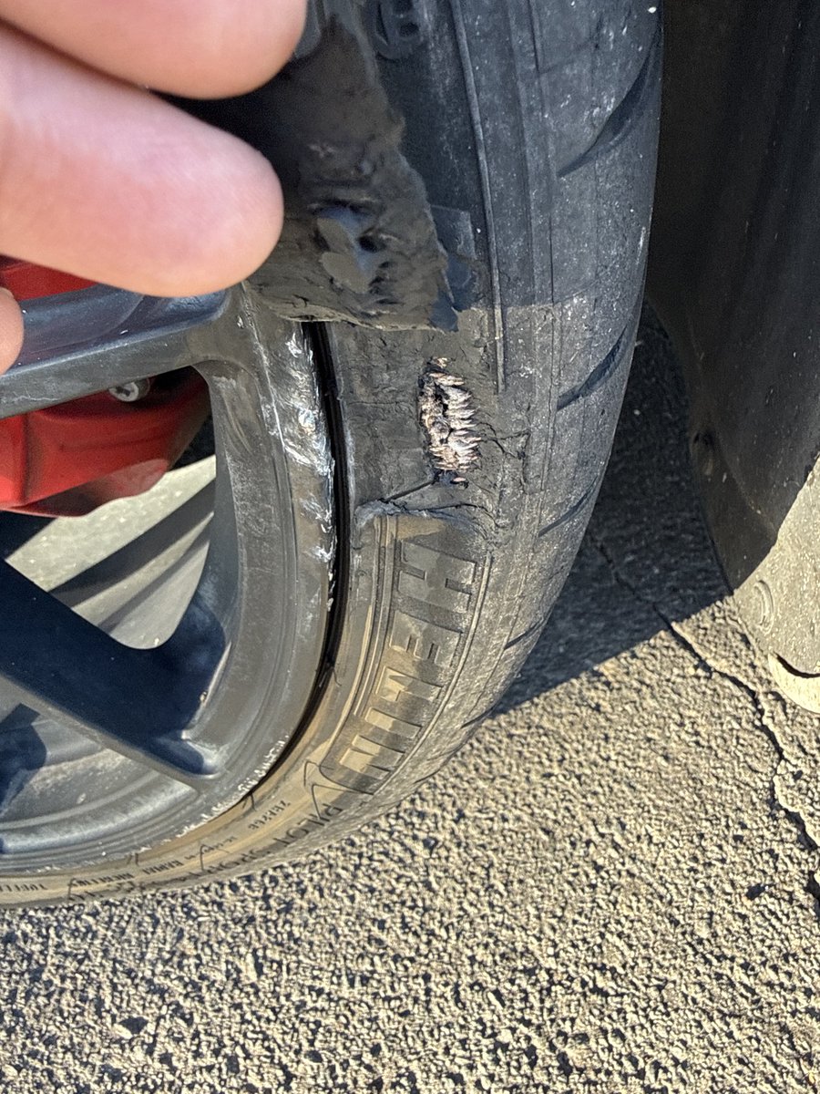 wadeanderson's tweet photo. FSD doesn’t yet know how to avoid potholes and I slammed hard into a large one. I should have been paying attention to to road better but since I was on an interstate and had FSD on, I wasn’t watching out for potholes like I should have been 🤷🏻‍♂️ https://t.co/v9RrvfXcpP