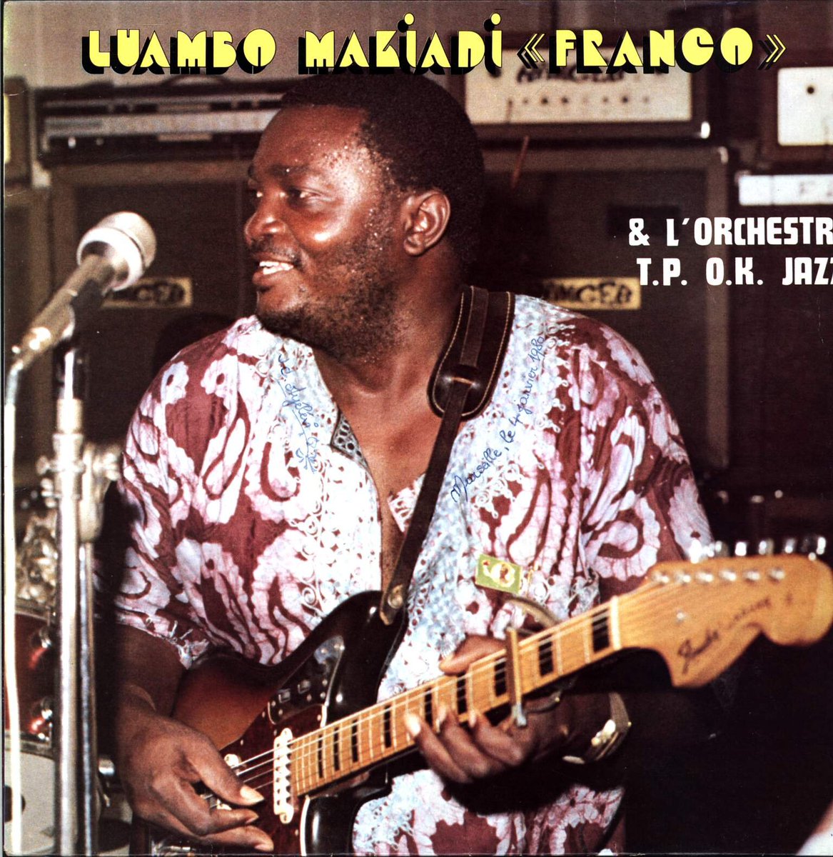 JabulaniRadio's tweet photo. The Day Kinshasa Stopped Singing

On October 12, 1989, the news reached Kinshasa, Franco Luambo Makiadi, the man whose guitar had narrated the lives of millions, was dead at 51.

All radios changed their tune. In their place came the slow ones, the aching, unhurried songs Franco had spent decades perfecting. Hour after hour, they drifted from open windows, taxi radios, and market stalls. Zaire, as the country was then called, declared four days of national mourning. For a nation not known for agreeing on much, it was a rare moment of shared silence, filled with a sombre mood. They all agreed they had lost a national treasure.

People came. They poured into the streets of Kinshasa in their millions, a tide of mourners spilling across the capital to say goodbye to the man they came to refer to as "le Sorcier de la Guitare," the Sorcerer of the Guitar. 

People received the news and processed it differently. Some wept openly. Others simply stood, shoulder to shoulder with strangers, humming melodies they had known since childhood. Others simply did not believe death could be that cruel.

It's easy to see why the grief ran so deep. Franco was not merely an entertainer. He had been there since 1956, he was the spinal cord of OK Jazz, a band that grew into one of the most influential in African music history and the world at large. For more than three decades, he fused Congolese rumba with sharp wit and fearless storytelling, building a body of work running to thousands of songs. Yes, you got me right, thousands of songs, with over 1400 well documented songs.

But what made him beloved was what he put inside those songs. Franco sang about everything: love gone wrong, money troubles, family quarrels, the small cruelties and absurdities of daily life, and, when he dared, the powerful.

In a country where honest reporting could be dangerous, his lyrics did the job the newspapers couldn't. People didn't just dance to Franco; they learned from him. His songs were advice, gossip, warning, and comfort, all wrapped in a groove you couldn't resist. In a very real sense, he was the nation's unofficial daily paper, delivered in song. This lived beyond his death and that makes him the great master of the art, the musical honour " Le grand maitre."

When he died, it felt less like losing a musician and more like losing a voice that had been speaking for everyone. The man who had given Zaire the words for its joys and sorrows was gone, and the only fitting tribute was to let those words play on.

More than three decades later, Franco's music still echoes through Kinshasa and far beyond, from Brazzaville bars to Nairobi matatus to playlists in different gadgets across the world. Everyone remembers him differently. The Sorcerer's guitar has gone quiet, no one to pluck the strings as sweetly as he did, but the spell seems never meant to break. You listen to him, and you cannot stop listening to more and more.

As we prepare to usher in his 37th anniversary, we know the master is gone but will forever live in our ears, heart and mind through music. Hey DJ, put on some makiadi music and don't cut any song before it ends!

Which music plays first?