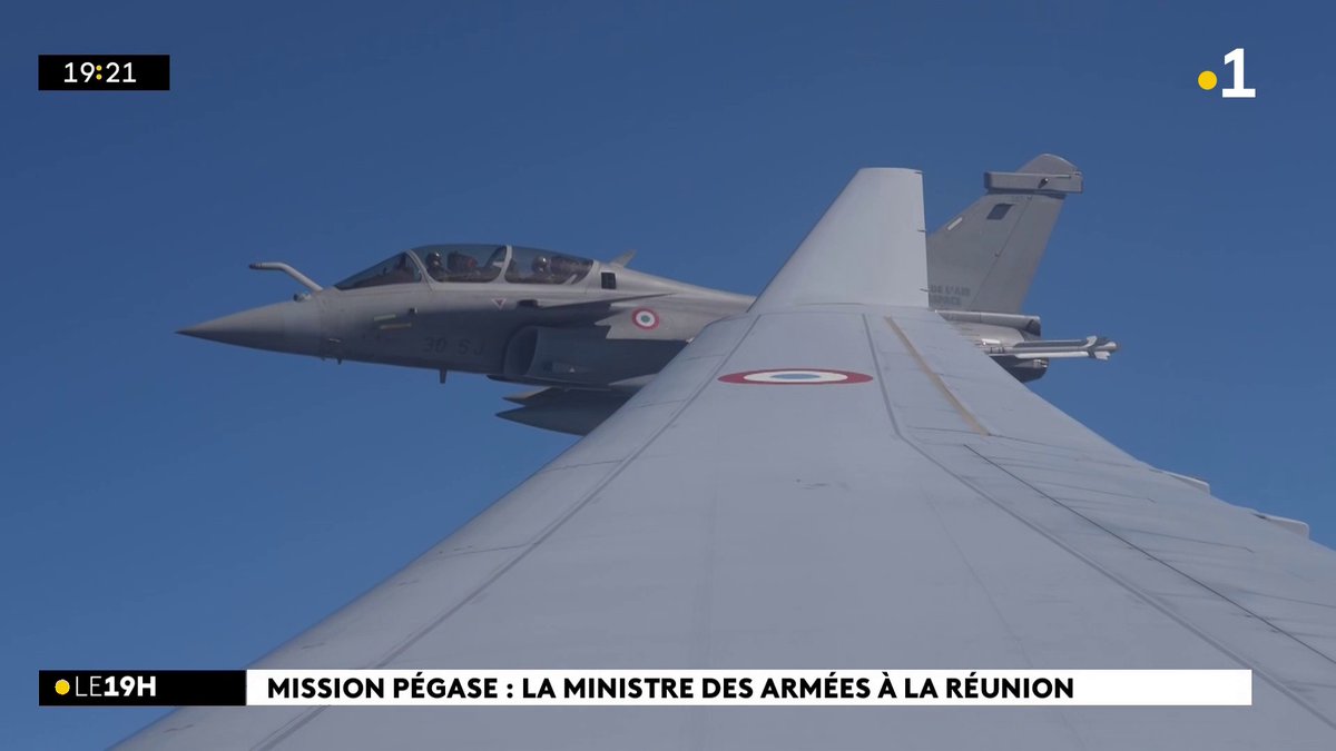 A French news broadcast screenshot (LE 19H) shows a Dassault Rafale fighter jet (marked 30-SJ) flying alongside another aircraft, with the caption 'MISSION PÉGASE : LA MINISTRE DES ARMÉES À LA RÉUNION.'