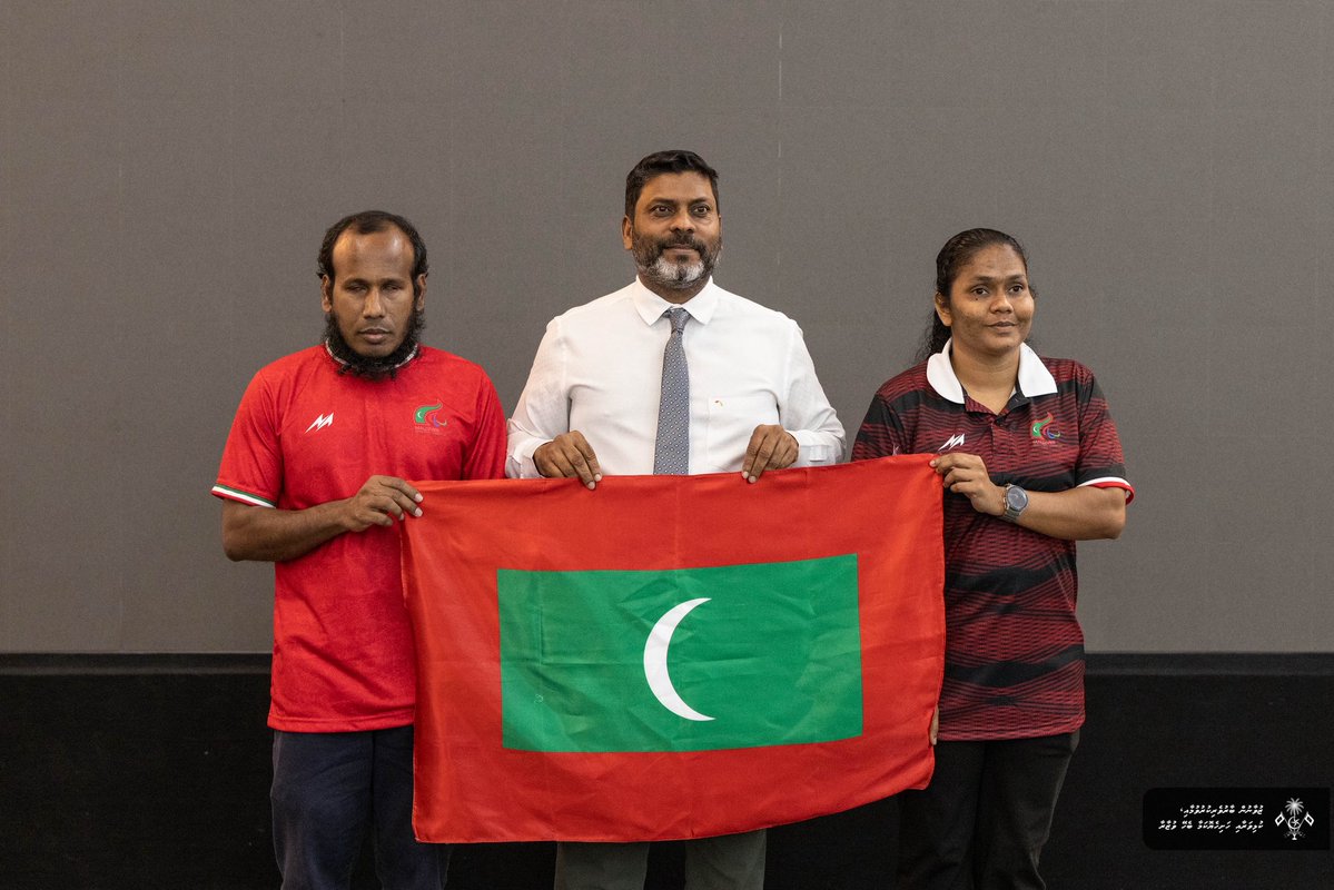 MoYSF_mv's tweet photo. Minister Rafiu attended the Flag Bearer Ceremony and T-shirt handover for the 5th Asian Para Games 2026.

Fathimath Ibrahim and Abdul Razzaq Abdul Samad were announced as the Maldives’ flag bearers for the Games.

The ceremony was graced by H.E. Rumiko Ishigami, Ambassador of Japan to the Maldives, along with key officials from the Embassy of Japan, the Ministry, and the Maldives Paralympic Committee.
