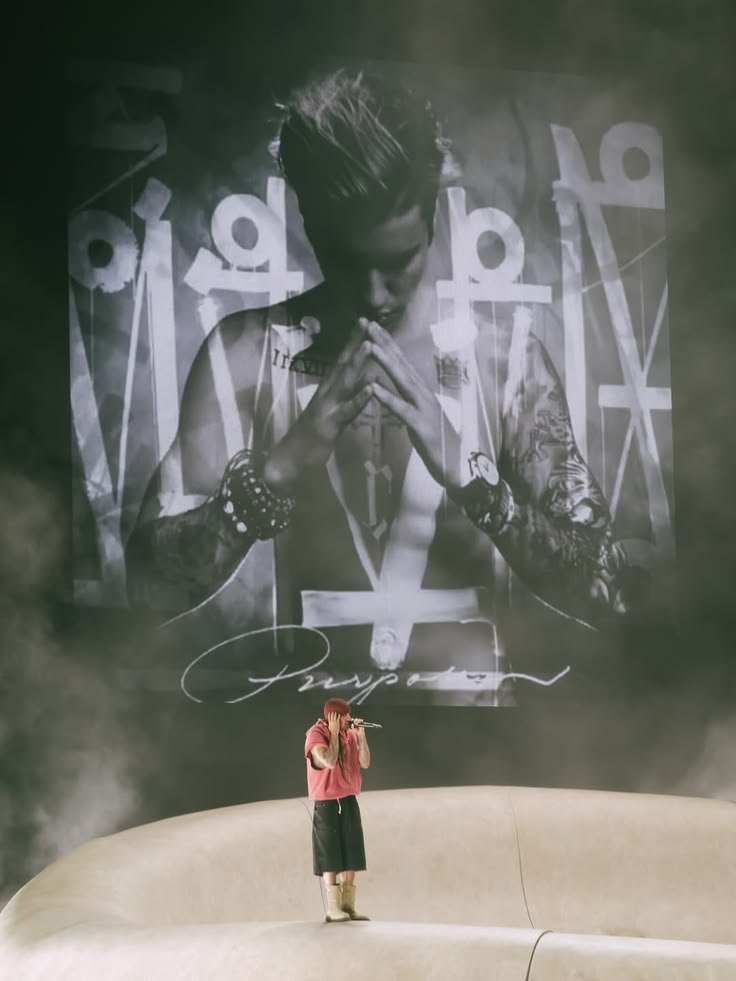 biebsdevotions's tweet photo. These shots of current justin in front of his legendary albums from different periods of his life gives me goosebumps https://t.co/kG8y3ZlhQi