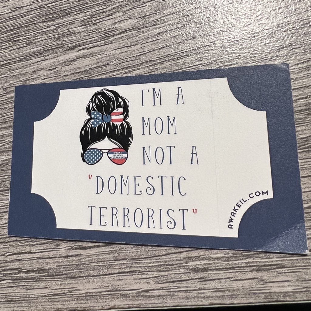 Shannon_A_IL's tweet photo. The National School Boards Association invented the “parents are terrorists” phrase, after weeks of coordination with the Biden White House, and AG Garland turned it into federal policy five days later.

A new @DOJ Weaponization Working Group report shows career officials warned the October 4, 2021 Garland memo was constitutionally dubious and aimed at non-federal conduct. It still went out. The FBI’s counterterrorism side opened assessments on parents—including moms in “right-wing” groups—while the NSBA letter explicitly asked the government to treat school-board protesters as the equivalent of domestic terrorists and use the Patriot Act.

Hence, the back of my business card.

That is the environment groups like my org @awake_IL walked into in 2021: ordinary parents objecting to curriculum, masks, and gender policies were pre-labeled as a threat so federal law enforcement could be pointed at school boards.

The NSBA later admitted there was no justification for the language. Illinois’s own school boards association quit the national group over it.

No terrorism prosecutions came of the effort.

Calling concerned parents terrorists was a political tactic.

The paperwork now confirms it.

We never stopped because of it. Onward!