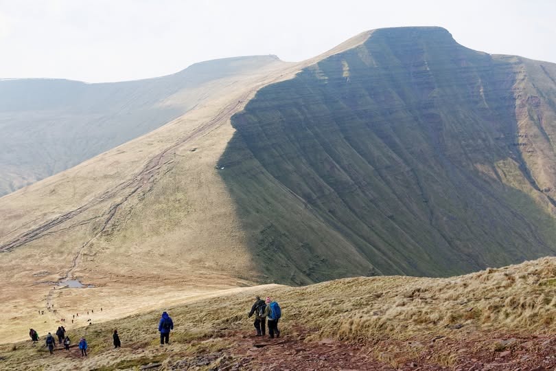 STWWMT's tweet photo. Want to stand on the summit of Pen y Fan, the highest peak in southern Britain? Soak in the breathtaking landscapes of Wales' Bannau Brycheiniog National Park. Contact me to start planning! #VisitWales #PenYFan #HikingAdventures https://t.co/8ZzPMPXP1H