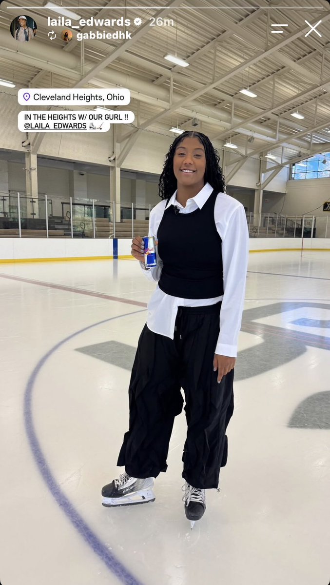 offsicing's tweet photo. glammed up wearing business casual while in skates and holding an open red bull on the ice. hell yeah. this is 2027 fashion and laila edwards just got there first https://t.co/g1a2ljbX77