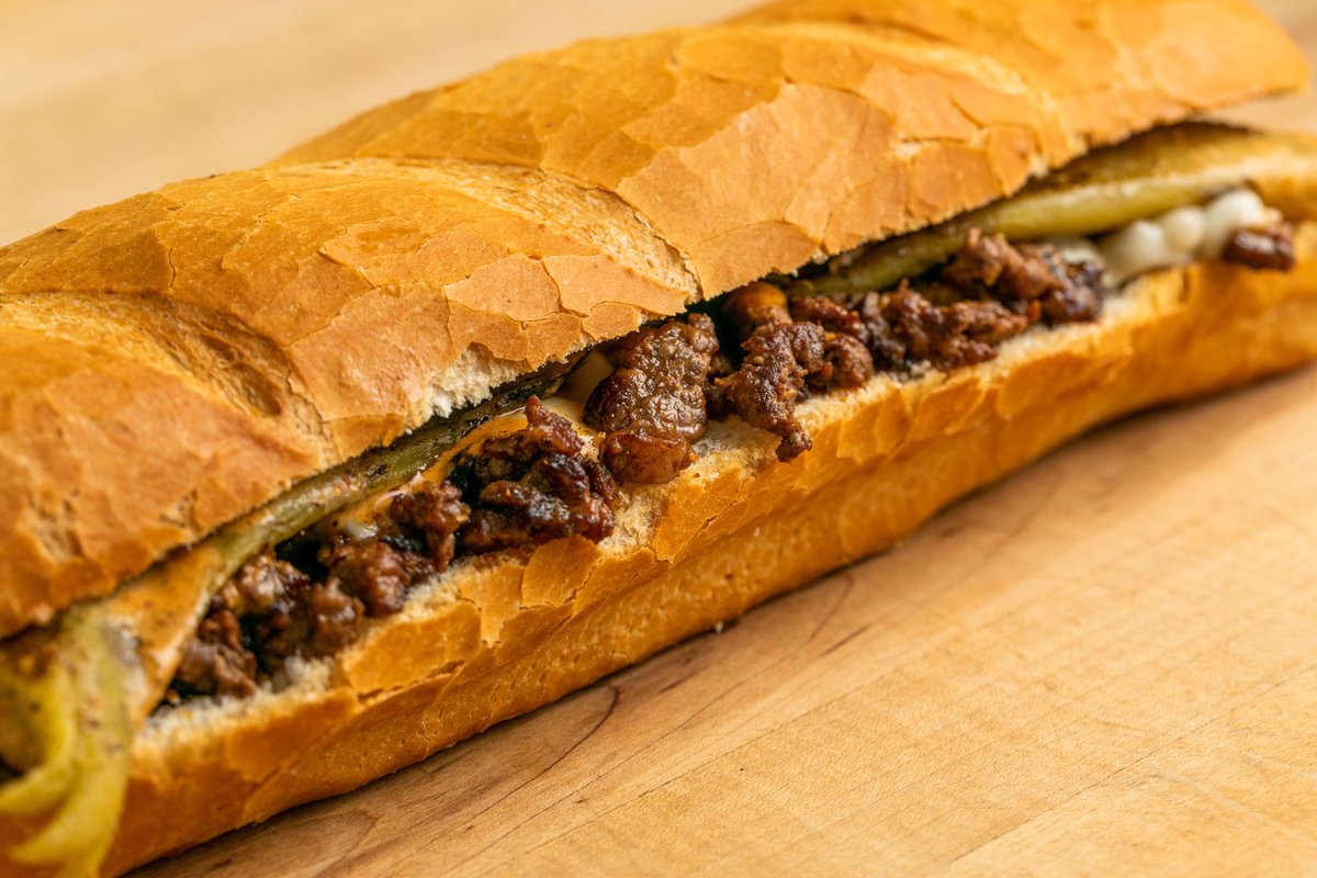 DEliasGrinders's tweet photo. Turn up the heat with Philly D'Fuego 🔥 Sliced grilled steak, melted provolone, spicy chipotle mayo, and roasted Anaheim chili peppers bring serious fire to every bite. Stop by D'Elia's Grinders and take on the heat today! 🌶️ #DEliasGrinders #PhillyDFuego #Cheesesteak https://t.co/eqAf2hJHD7