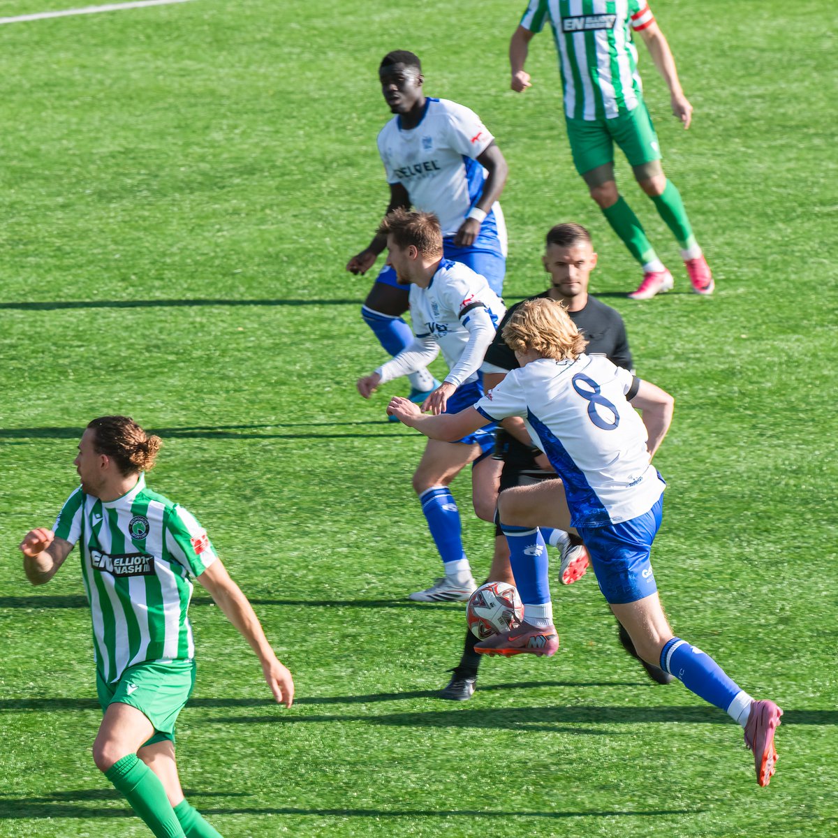 GomboczSteve's tweet photo. Player action photos taken during the game between Bury v Bromsgrove Sporting on 3/10/26. One photo taken just before No 10 George Glendon's goal, a well taken goal. @buryfcofficial #bfc140 #shaker #BuryFC #PartOfit @whitebluearmy https://t.co/P606BDBk9Q