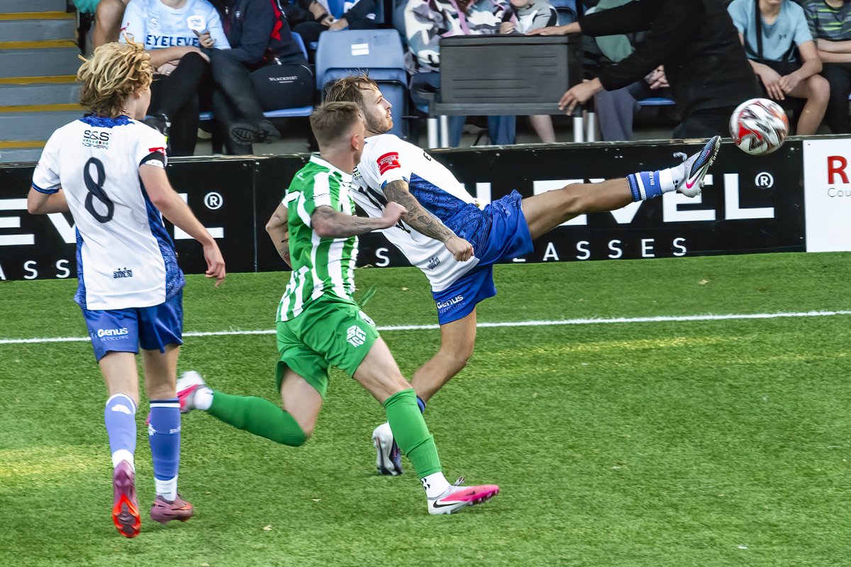 GomboczSteve's tweet photo. Further player action photos taken during the game Bury v Bromsgrove on 3/10/26. Both teams worked hard for a result which eventually went Bury's way. @buryfcofficial #bfc140 #shaker #BuryFC #PartOfit @whitebluearmy https://t.co/uaNaBA8CQD