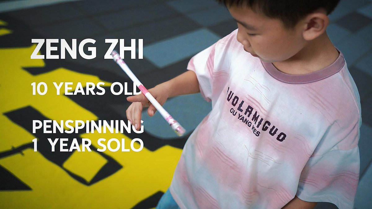 A video thumbnail showing a young boy named 'ZENG ZHI' who is 10 years old, performing penspinning with 1 year of solo experience.