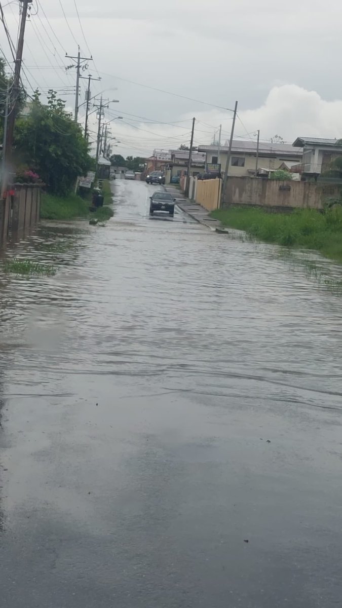 TTWeatherCenter's tweet photo. 1:30 PM - Orange Field Road, which runs between Chase Village and Carapichaima, is impassable to most vehicles with multiple areas of the roadway flooded. Avoid the area and venturing into flood waters. Expect traffic delays. 

Adverse Weather Alert in effect for the western half of Trinidad until 5:00 PM today: https://t.co/qNKuoZRIZ2