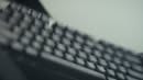 A close-up, angled shot of a black keyboard, likely the Logitech PRO X2 RAPID, showcases its sleek design and key layout as referenced in the accompanying promotional post about quick keyboard settings and gaming performance.