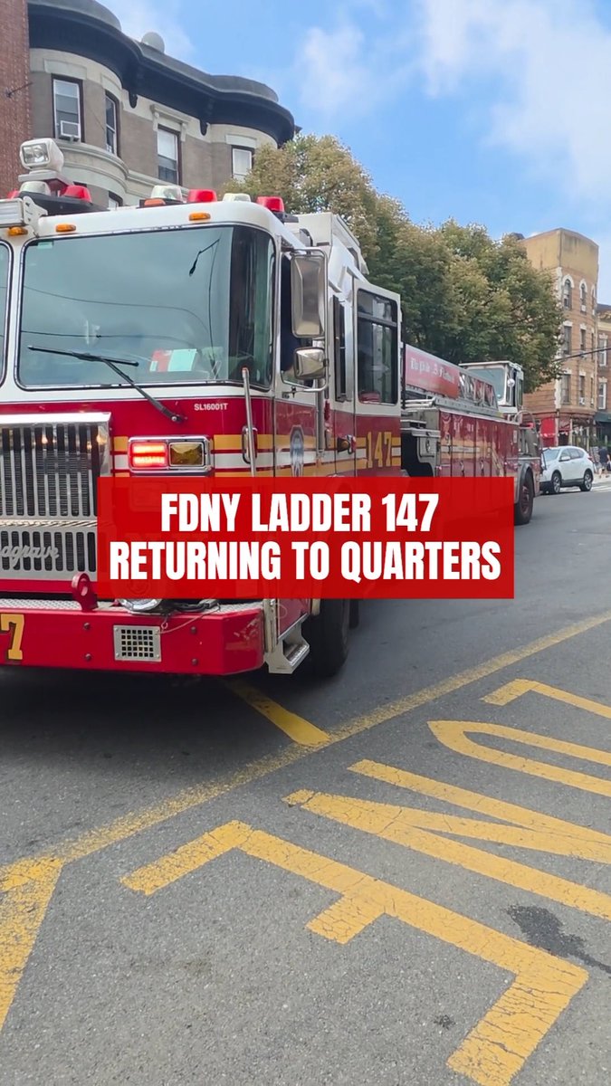 A red FDNY Ladder 147 fire truck, marked "147" on its side, drives down a street with yellow "BUS" lane markings as it returns to quarters. A red banner overlay reads "FDNY LADDER 147 RETURNING TO QUARTERS," corresponding to the caption noting the truck's return to its station on Cortelyou Road in Brooklyn.