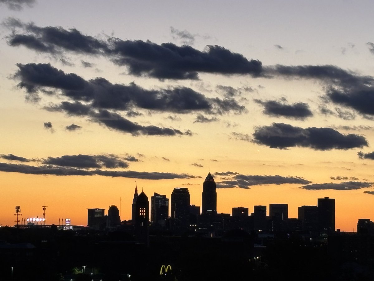steve_intheLand's tweet photo. Downtown Cleveland from the top of the Cleveland Clinic parking garage with Progressive Field #GoGuards to the left and a beautiful sunset in the background. Let’s get a win! https://t.co/W8Ci5HrKYT