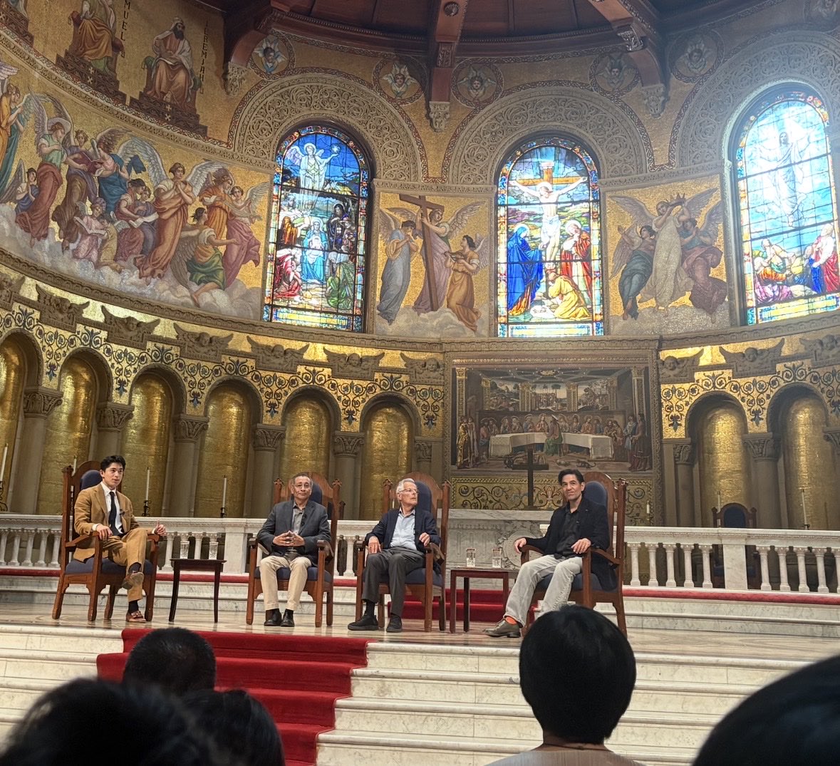 DoctorYev's tweet photo. AI panel at Stanford. Yes, in a church.

With the highly respected Myron Scholes and DPR. Engineering perspective balanced by Benjamin Van Roy from Stanford/ @GoogleDeepMind 

@JohnathanBi moderated & eloquently connected dots: 

“AI overoptimization is like humans losing meaning.”

> AI agents sometimes go into circles or hallucinate. 
> That's like when a person is stuck. Gets in a rut.

I'm paraphrasing above since it was a deep discussion about consciousness, economy, and unconventional ways to find signals. 

Topics were both extremely technical yet with a touch of compassion. Interesting bridges are being made human + AI.