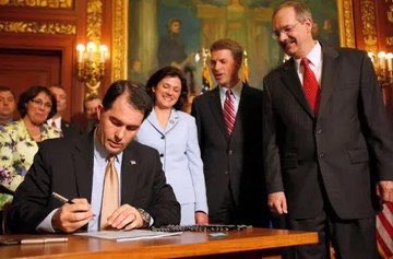 ScottWalker's tweet photo. WI law requires official photo ID for in-person voting on Election Day, early in-person voting, and absentee ballots by mail. How do I know? I signed the law. https://t.co/QrpFz5qSJ7