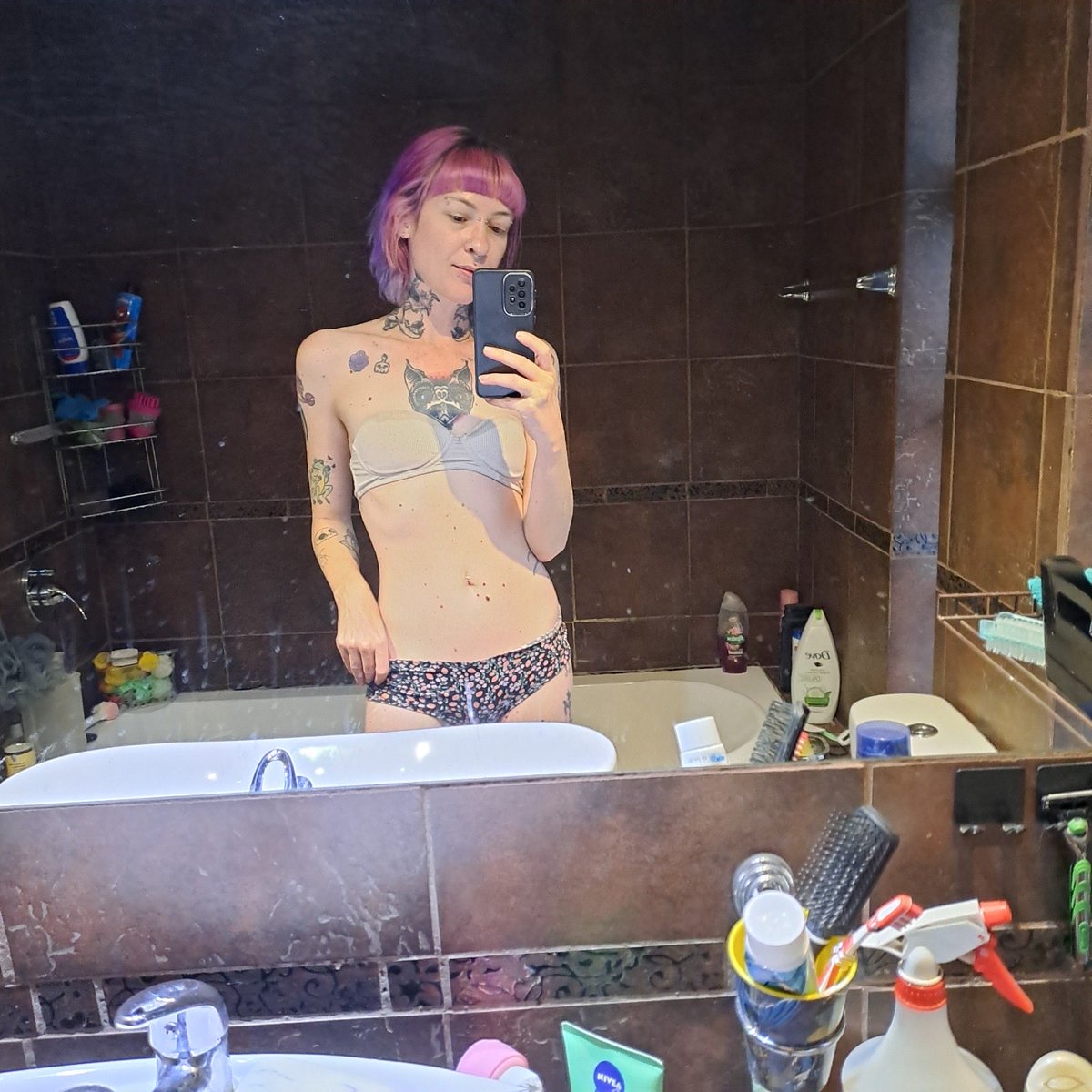 JustBlake777's tweet photo. There’s a little more to this set… 👀 If the cute purple bangs aren’t enough, well… just know it all comes off 😈

#goth #altgirl #purplehair #bangs #tattoos https://t.co/zpwJz1qdjD