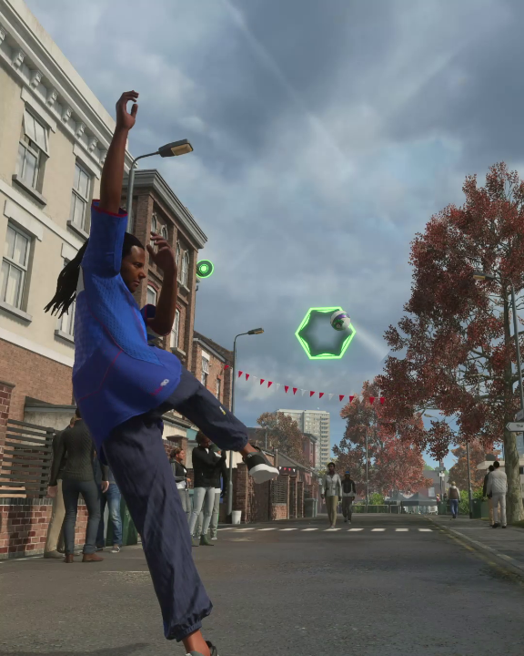 A character in a blue jacket and pants strikes a dynamic pose in a London street scene with red bunting and autumn trees, where glowing green football icons float in the air. The image reflects the post's playful reference to FC 27, an EA Sports football video game, with the floating soccer ball and hexagonal icons evoking a glitch-like intrusion of the game into the urban environment.