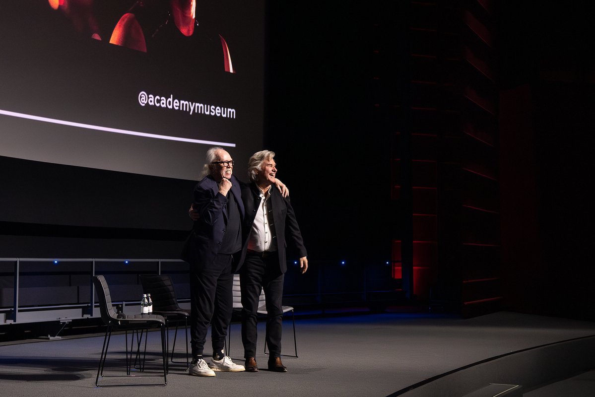 AcademyMuseum's tweet photo. Thank you to John Carpenter and Kurt Russell for joining us at the Academy Museum for an unforgettable evening celebrating ESCAPE FROM NEW YORK (1981) and ESCAPE FROM L.A. (1996), and to everyone who came out to celebrate two icons of cinema with us!

The Horror Show is made possible in part by leadership support from Hammer Films and John Gore Studios. Generous support provided by Dave and Tara Dollinger, Regal, and Kimberly V. Strauss. Additional support provided by the Los Angeles County Board of Supervisors through the Department of Arts and Culture. Academy Museum Digital Engagement Platform supported by Bloomberg Philanthropies. Technology solutions generously provided by Christie®. Academy Museum film programming is generously funded by the Richard Roth Foundation. 

©Academy Museum Foundation, Photo by: Randy Shropshire