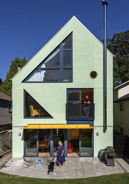 Architizer's tweet photo. #ProjectOfTheDay: Fluevog House by MA+HG Architects
The Fluevog House brings bold colour and geometric forms to a Vancouver family home, with a sea-green gable, circular and triangular windows, and a bright yellow roof deck. Designed as a Net Zero home, its playful geometry also responds to the practical demands of solar energy and high-performance construction.
📍 Vancouver, Canada #ArchitizerAwards
Photos by: Janis Nicolay Photography
Details: https://t.co/8ZTBst2jFw