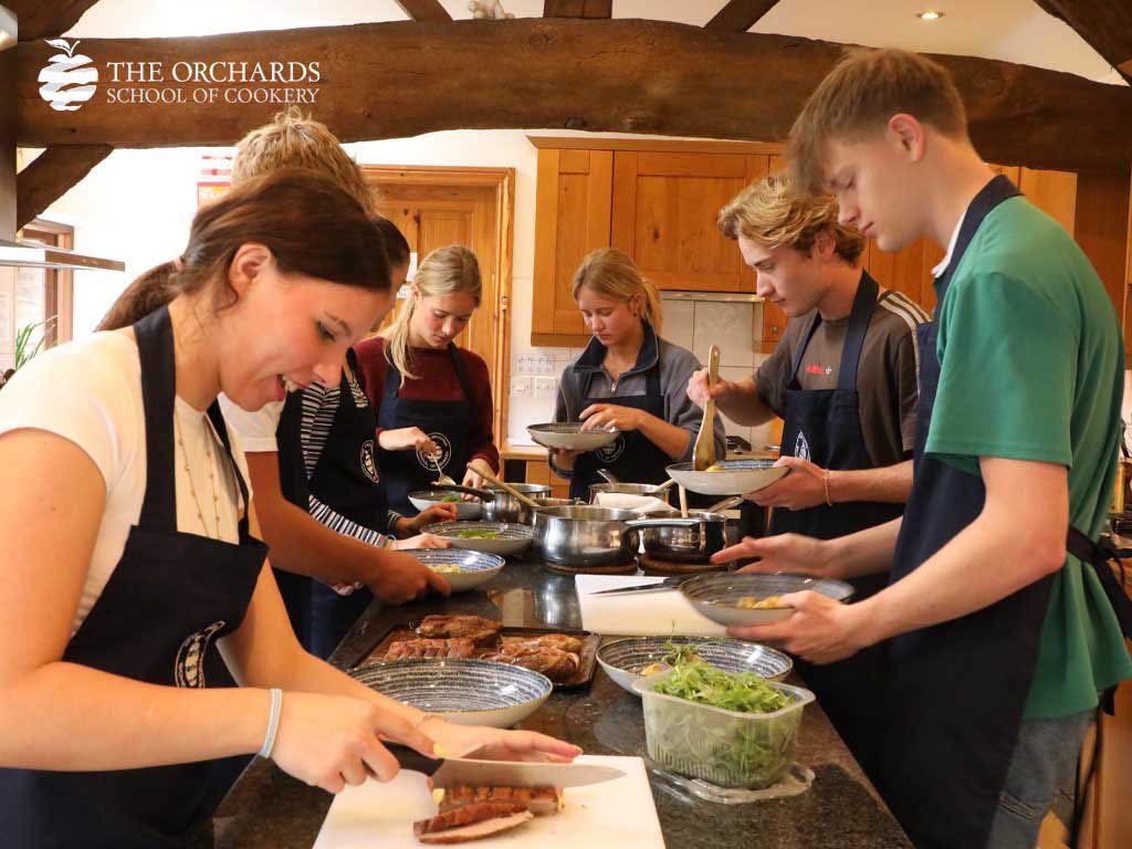OrchardsCookery's tweet photo. Back in the Kitchen! 👩‍🍳 Our returning Chalet Cooks kicked off week two with beautiful Lamb Racks, while our latest Chalet Cooks began their culinary journey with delicious Duck with a Wild Berry Sauce. 😋✨ https://t.co/Hy8zup6QqX