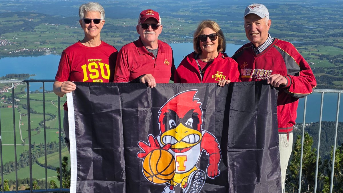 CycloneATH's tweet photo. This week's @MidAm_EnergyCo #ISUflag photo comes from Rocky and Mary Brown and Andy and Cindy Kail in Bavaria Germany! 🌪️

If you want your chance to be featured be sure to email your #ISUFlag photos to cy@iastate.edu 📸 https://t.co/O8R7mRlohN