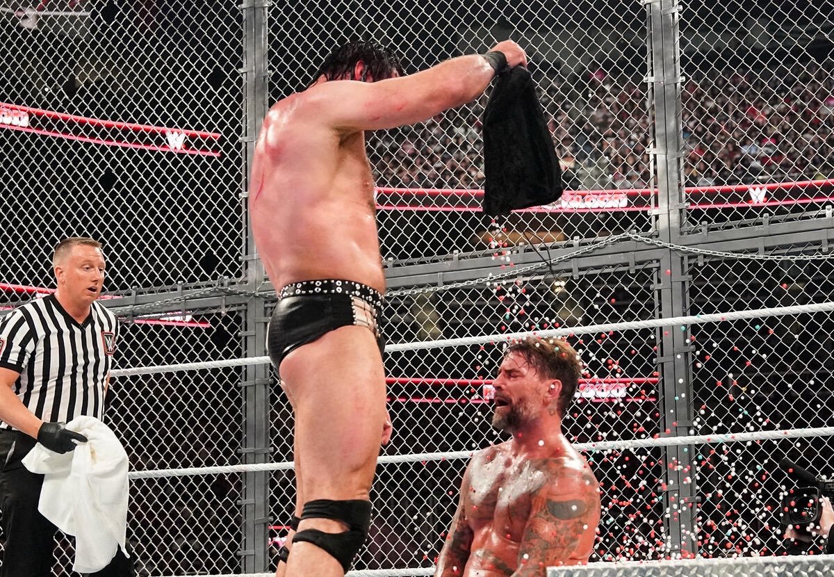 WrestleOps's tweet photo. 2 years ago today, the legendary CM Punk vs. Drew McIntyre Hell in a Cell Match took place. https://t.co/Cf0mGxk63b