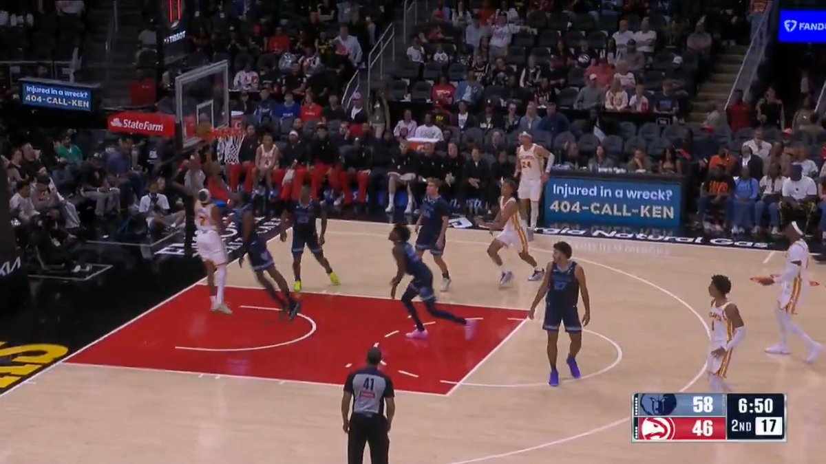 An Atlanta Hawks vs. Memphis Grizzlies NBA game is in progress, with the scoreboard showing the Grizzlies leading 58-46 with 6:50 left in the 2nd quarter. The action appears to center on the paint, with players from both teams battling for position near the basket, supporting the post's excitement about Nickeil Alexander-Wright's preseason readiness.