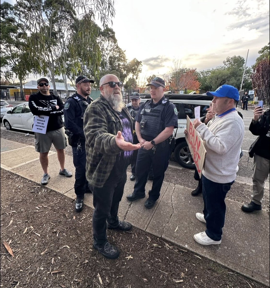 TruthtellerADL's tweet photo. WOKE up Adelaide (Groomers) 

This is why all parents must remain vigilant. These type of people are coming for your kids. They want you to be and think like them, you can see right here again. 

Extremely dangerous attitudes to have around young minds. Especially children that aren’t your own. 

As we’ve seen before, when you defend your own 4 year old child. Trans ACTIVISTS even arrive at kindergartens and primary schools to fight against you. 

When you’re willing to chuck a skirt on and dye your hair blue, you really have to question the decision making abilities and ultimately their mental capacity. 

After all, these people do vote for The Greens SA and Australian Labor Party, so something’s not right there already! 

#LeaveOurKidsAlone #2genders #blowflies #Leftards #phasingout