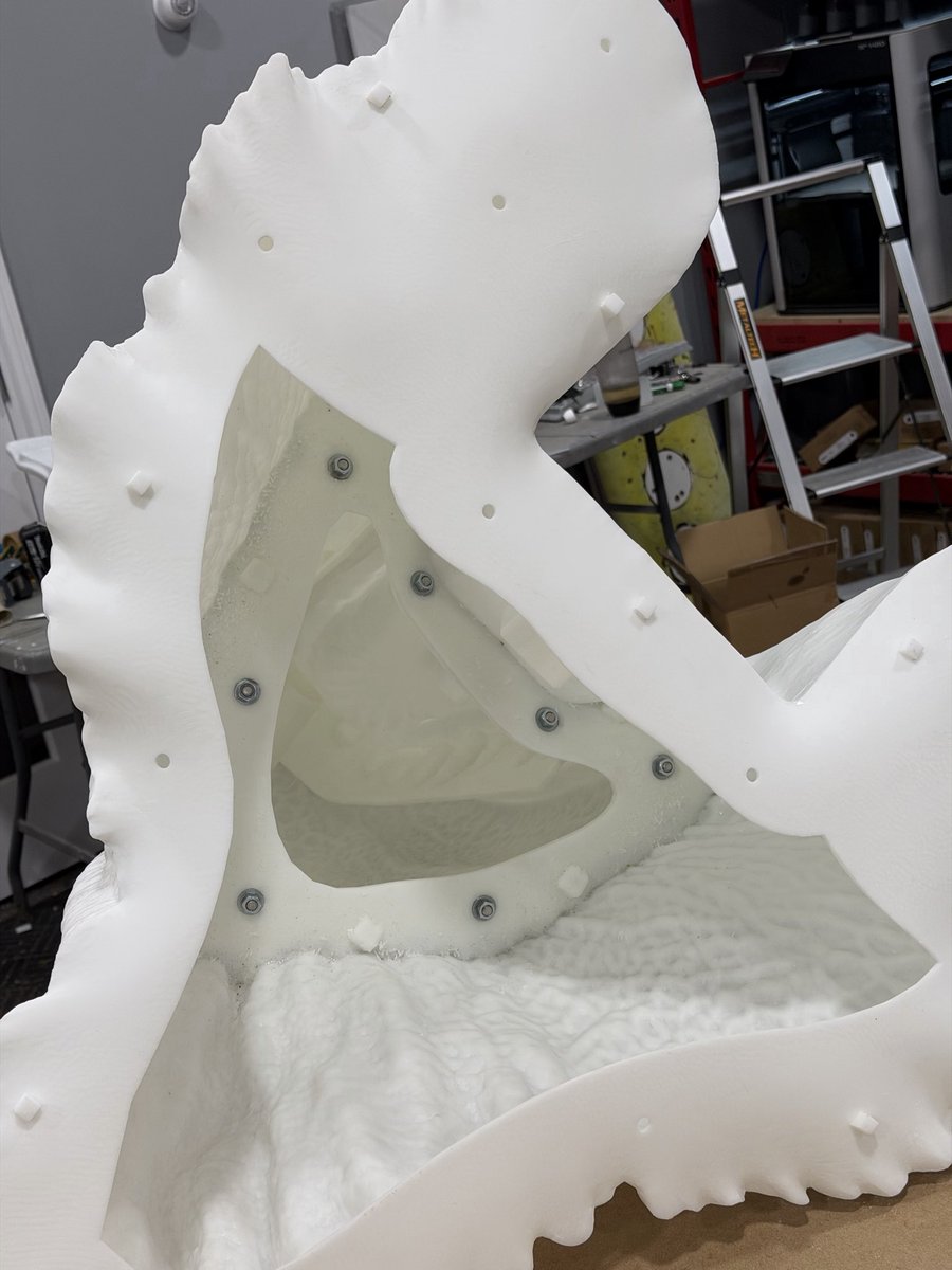 hellbendermodel's tweet photo. After the digital sculpt was complete, I cut it into parts to fit my printers. Done in zbrush. The head was split into 12 main parts, which were bolted together. Gaps between parts filled. The cuts were made to follow the outline of the scales to reduce visibility of the seams. https://t.co/5ogWpKdM1a