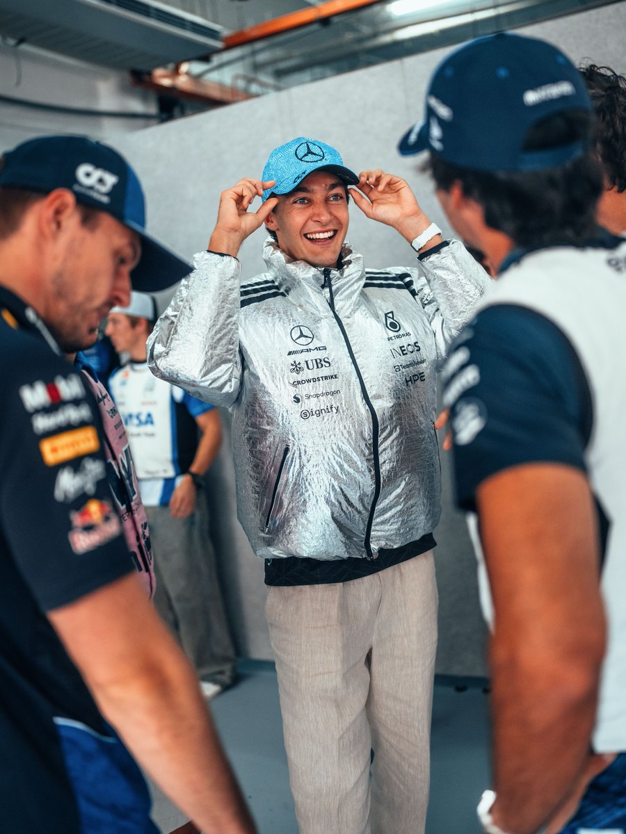 F1Mercedesrp's tweet photo. Russell's sparkly cap gifted to him by a fan, was the star the of driver parade ๐ฉตโจ
#F1RP #BahrainGPRP - @Formula1FRP https://t.co/68idsUcMRU