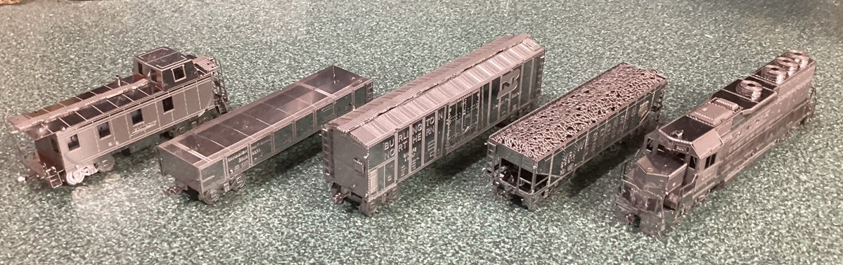 CK124theTSE's tweet photo. Metal Earth Freight Train Steel Model Kit Gift Set 

- BNSF EMD GP40 Diesel Locomotive
- Wisconsin Central Hopper
- Burlington Northern Boxcar
- Canadian/Canadien National Gondola (“do anything” car)
- BNSF Caboose https://t.co/gxjCuW8SvB