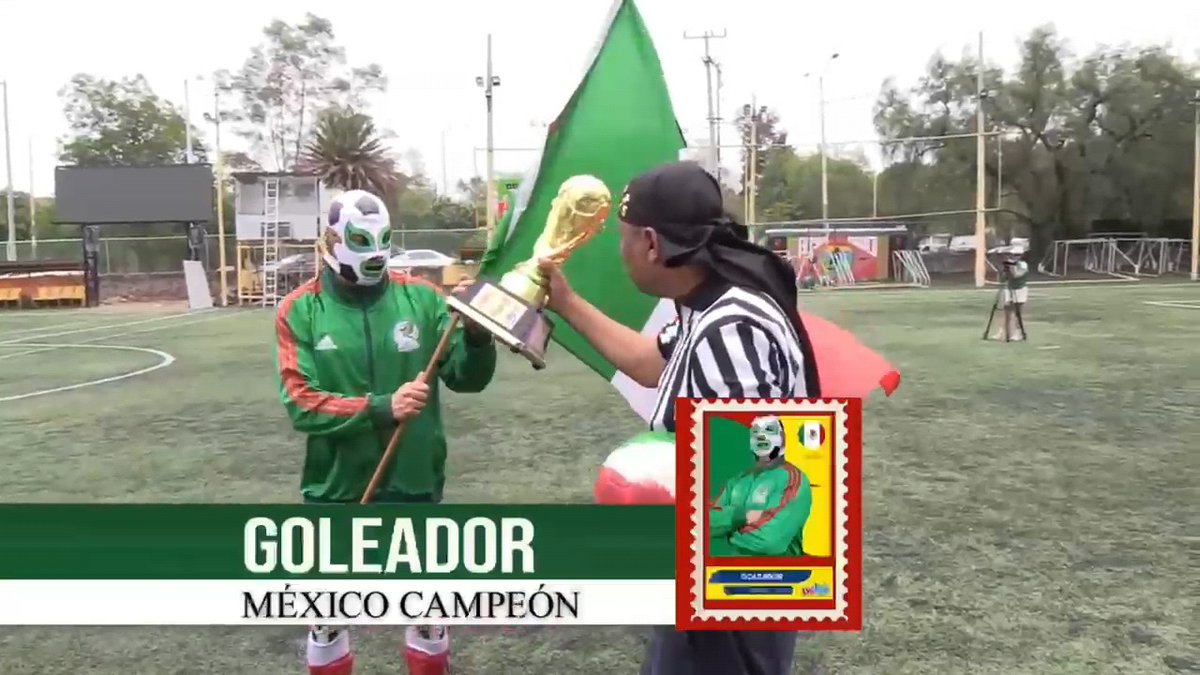 A scene on a soccer field shows a masked wrestler in a green Mexico tracksuit holding a Mexican flag while receiving a golden World Cup-style trophy, with overlay text 'GOLEADOR / MÉXICO CAMPEÓN' and an inset trading-card style image.