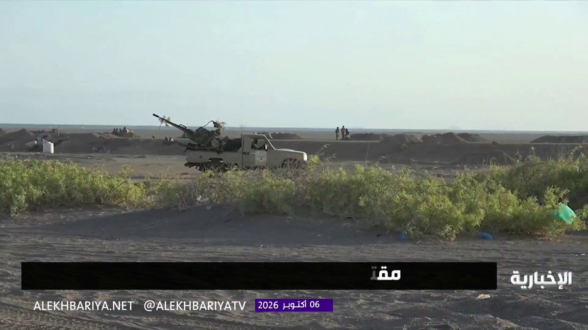 A military vehicle with mounted artillery is positioned in a barren landscape with sparse vegetation, as shown in footage from Al Ekhbariya TV (@alekhbariyatv) dated October 6, 2026, which reports on the killing and injury of 250 Houthi militia elements on the Taiz axis.
