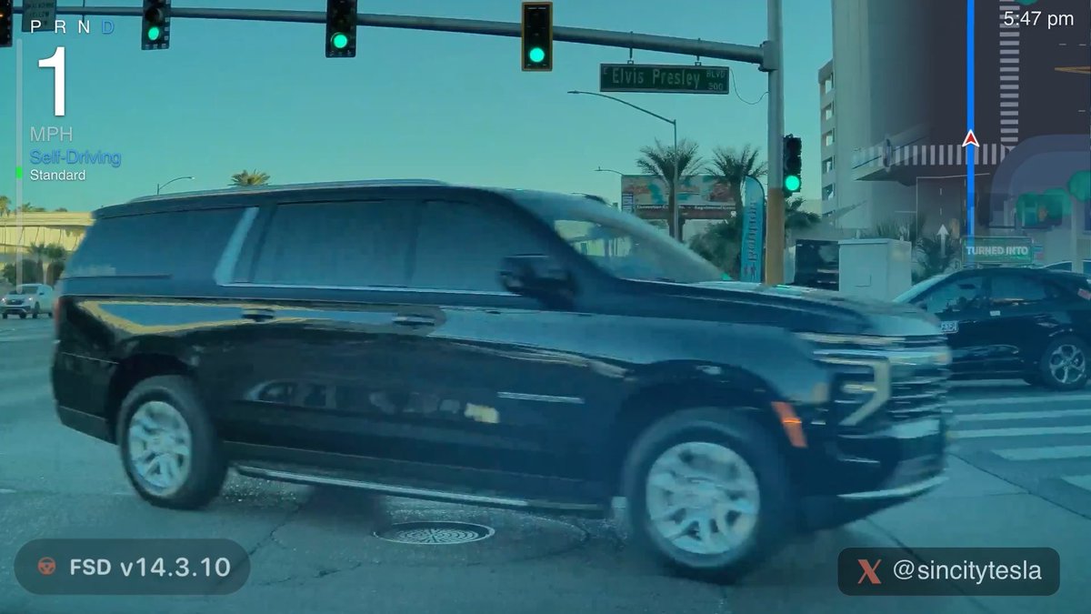 A screenshot of Tesla's Full Self-Driving (FSD) software (v14.3.10) navigating around a black SUV at a crosswalk with an 'Elvis Presley' street sign visible, watermarked '@sincitytesla'.