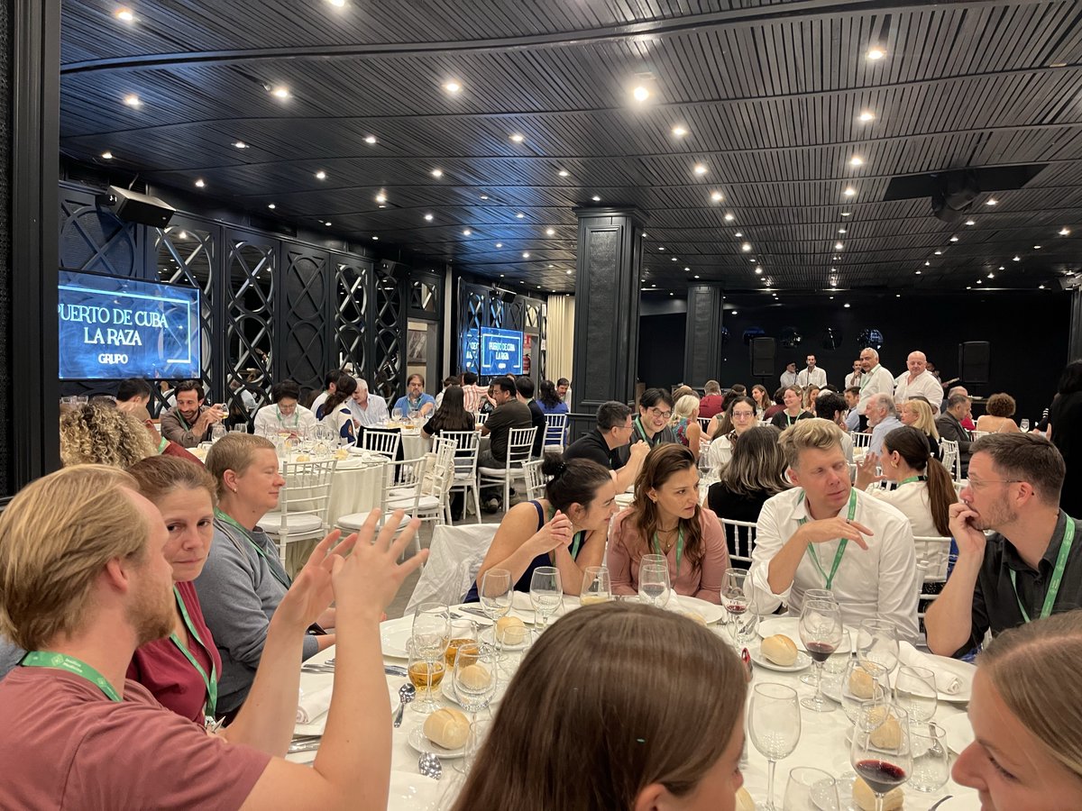 CellPressEvents's tweet photo. Entertaining walking tour through Plaza de España to a memorable Meet the Speakers dinner! Attendees chose a speaker to join for a multi-course meal, then a live band got the room dancing, with co-organizer Rafael de Cabo leading the way! #CSAging2026 @CellPressEvents https://t.co/cn28ExQ9w6