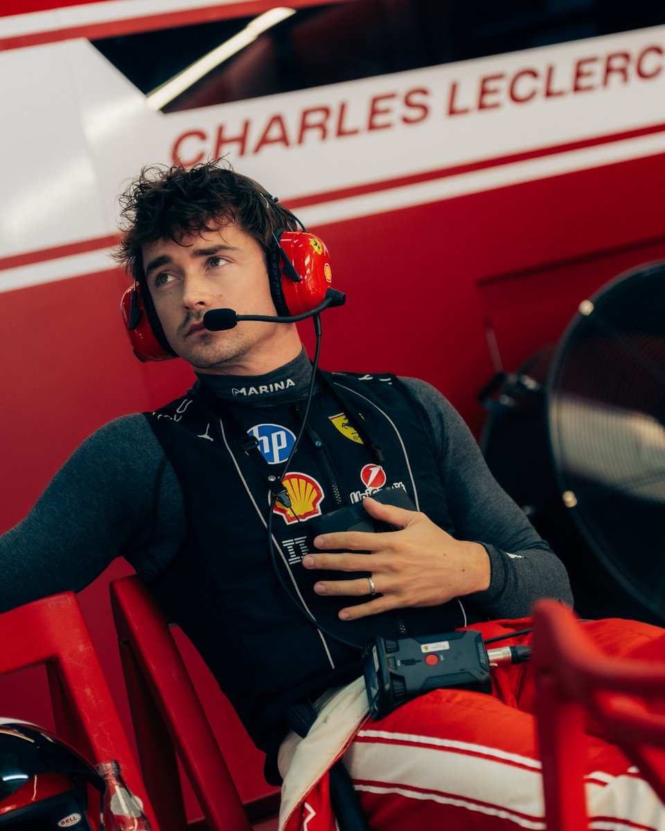 ScuderiaFerrari's tweet photo. Waiting out the rain delay together ☔️🗣️ https://t.co/IDkxgEETiY