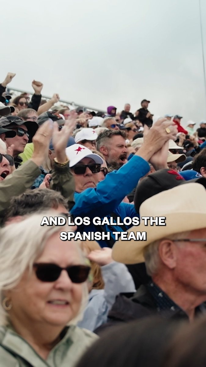 A crowd of spectators cheering at an event, with the text overlay 'AND LOS GALLOS THE SPANISH TEAM'.