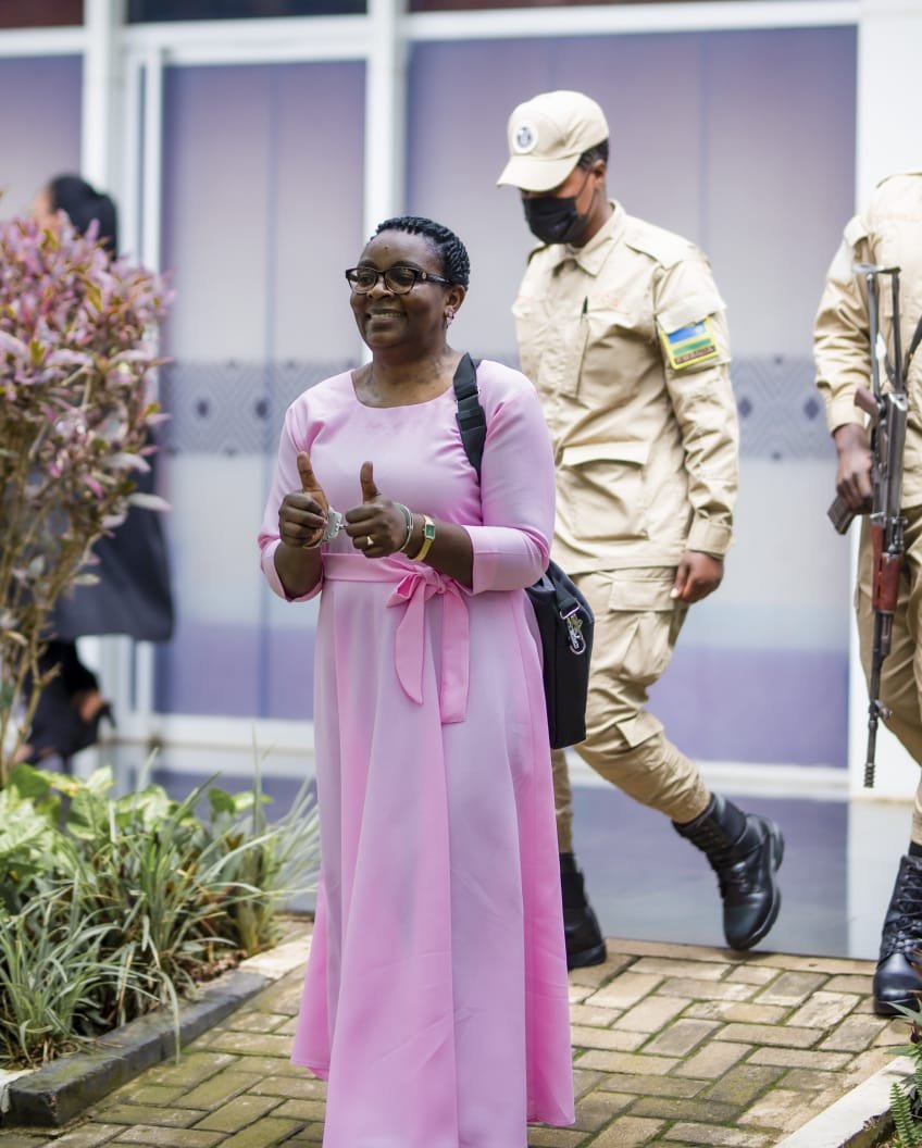 NormanIshimwe's tweet photo. There is something striking about this image.

Victoire Ingabire, in prison clothes, surrounded by armed guards — yet smiling, both thumbs up.

For many Rwandans, an image like this carries emotions that statistics and political statements cannot capture: courage, resilience, sacrifice, but also a profound longing for a country where political differences can be expressed freely and peacefully.

She returned to Rwanda in 2010 knowing the risks, determined to pursue her political struggle peacefully. Sixteen years later, she is again in detention and before the courts.

Ultimately, this is bigger than one woman or one political movement.

Rwandans should be free to hear different ideas, debate them, support them or reject them — and make that choice themselves.

@VictoireUmuhoza