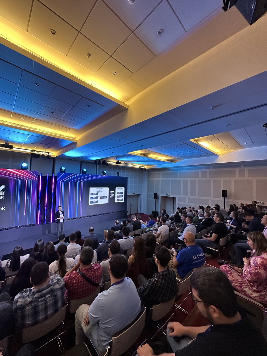 bigdataweek's tweet photo. 🔵 Eugene Klyuchnikov explains how @Zalando moved ~100 teams and dozens of pipelines to a new stack in three months, using AI-driven automation and flexible adoption paths. The case reports 52% lower compute costs. #bigdataweek #bdw2026 #bdwbucharest https://t.co/3N3i18XYt2