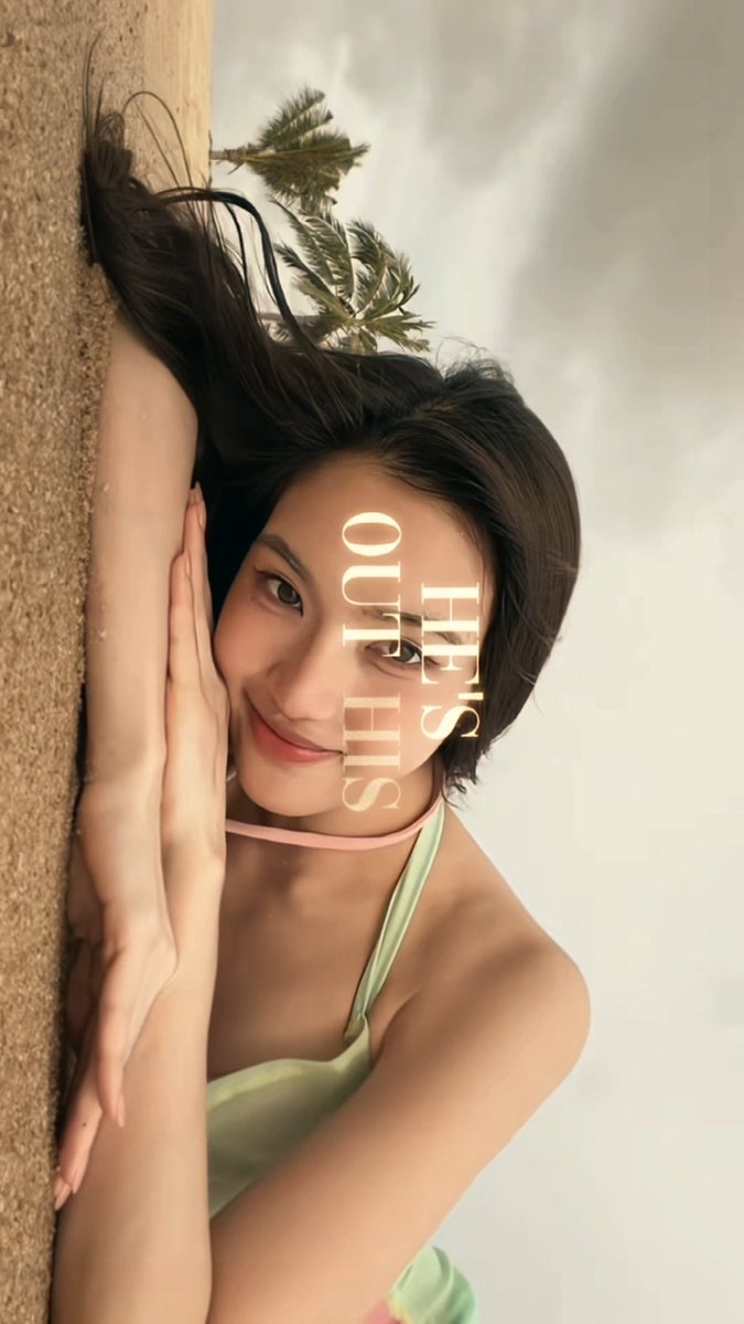 A promotional photo features a smiling young woman with long dark hair in a light green outfit leaning against a textured tree trunk, with text reading "HE'S OUTFIELDS".